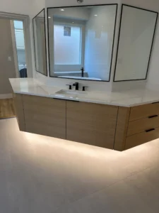Elegant bathroom with modern fixtures and lighting featured in a Bathroom Remodel Planning Plano project